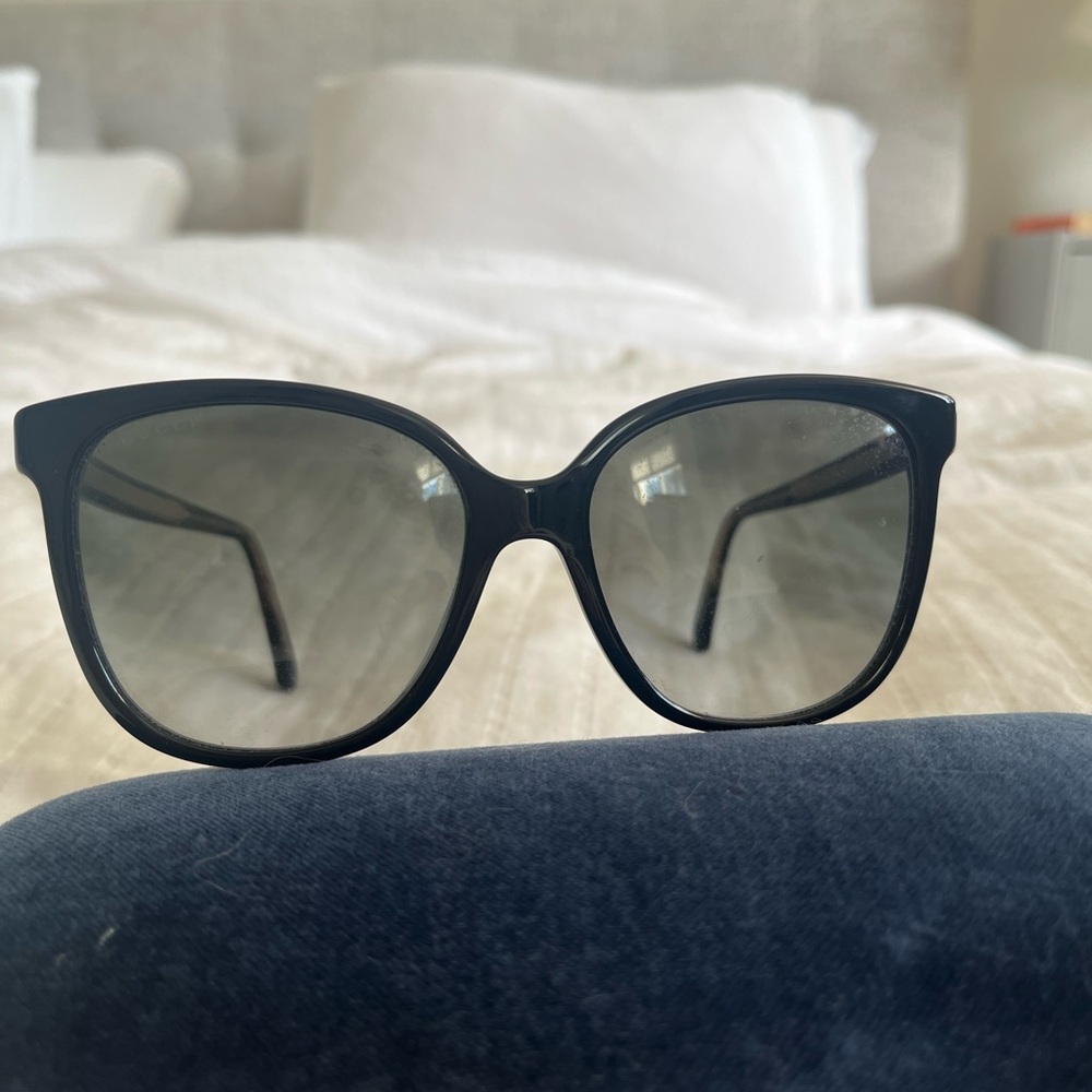 Oversized black Gucci sunglasses